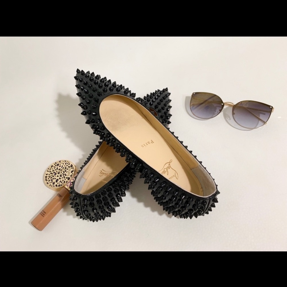 Christian Louboutin spiked flats.